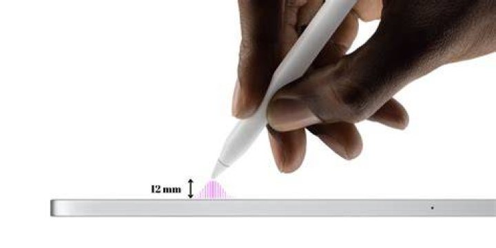 An Apple pencil is resting on an iPad that has Snapchat pulled up on the app store. 