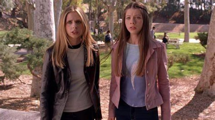 Dawn (Michelle Tractenberg) is held by the throat by a vampire in 'Buffy the Vampire Slayer' episode "All the Way."