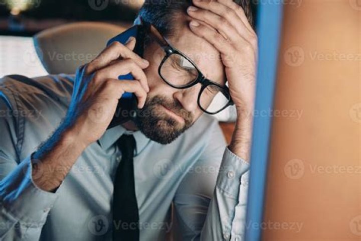 Frustrated man on phone