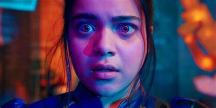 Kamala Khan looks shocked while strapped into Captain Marvel's spaceship in The Marvels.